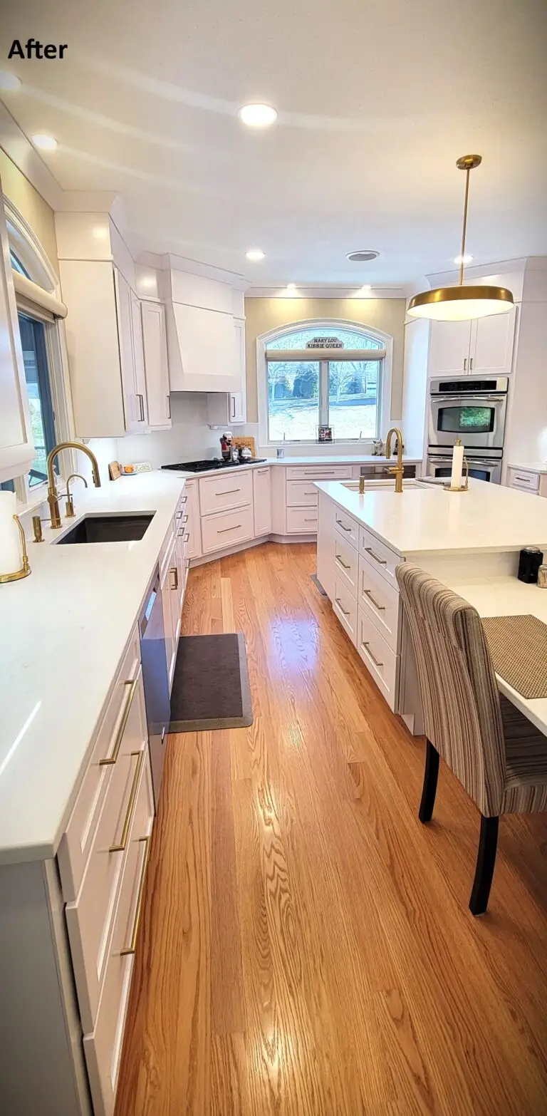 Kitchen transformation showing new white cabinetry, quartz countertops, and improved layout with center island